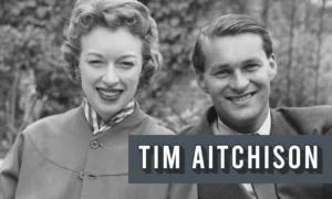Tim Aitchison and June Whitfield smiling together in a vintage black and white photograph, 1950s